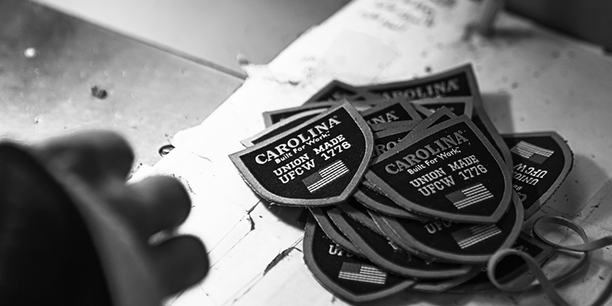 Carolina union built badges being made.