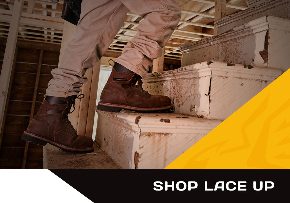 Shop lace up. A man walking up the stairs wearing the Gruntz 8" Steel Toe Work Boot in brown. Shop men's lace up.