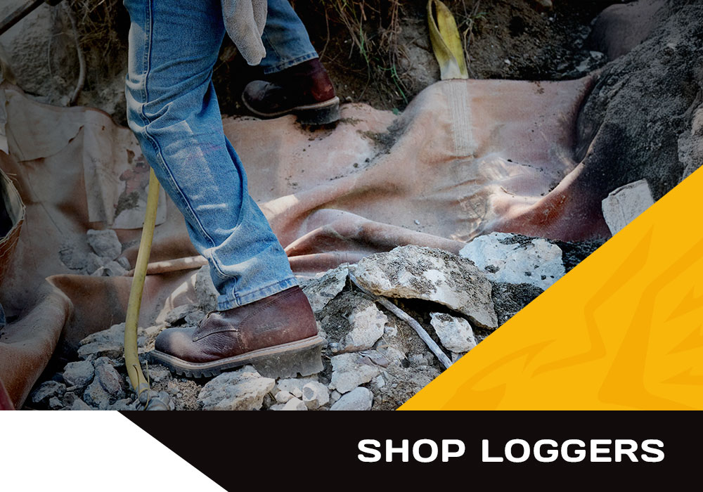 Shop loggers. A man working wearing a Carolina logger boot.